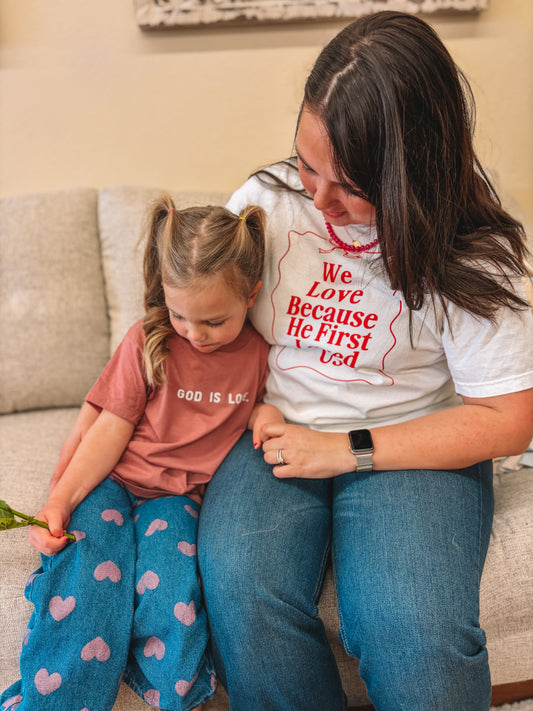 We Love Because He First Loved Us Tee